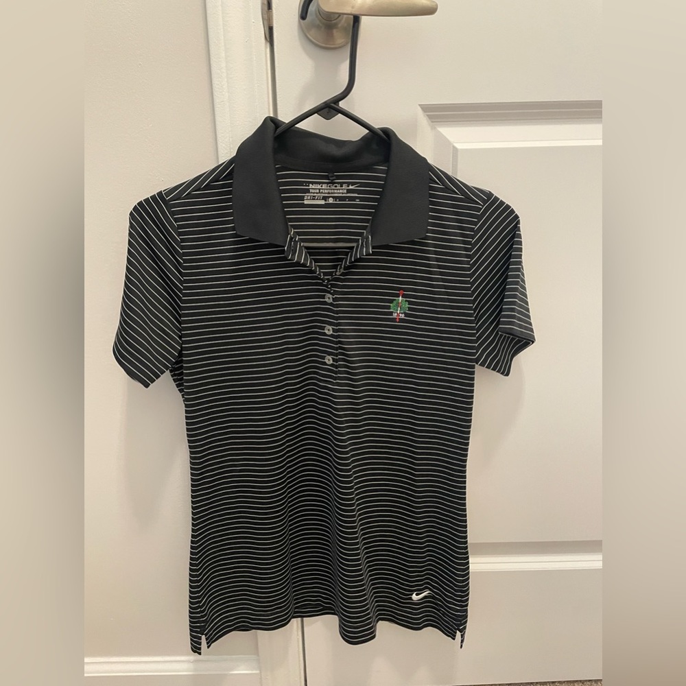 Women’s Nike golf shirt size small.